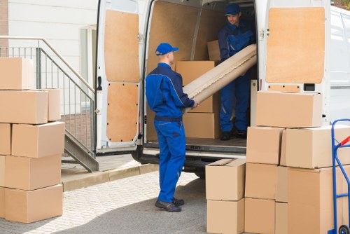 Man and van loading boxes for a flat move in Wandsworth