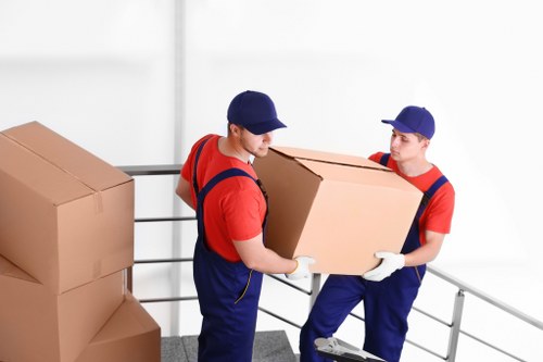Removal van and moving team in Wandsworth residential street