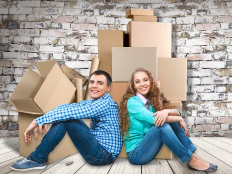 Removal team planning a move in Wandsworth with boxes and van