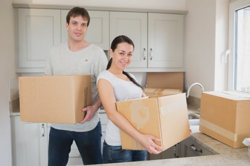 Careful loading of fragile belongings into a van for a Wandsworth move